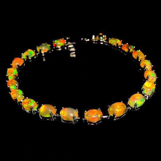 Oval Cut Fire Opal Silver Tennis Bracelet 50.81(ct)