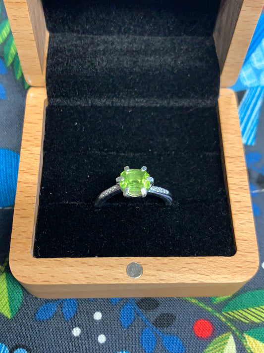 Natural 7mm Parrot Green Peridot Solitaire Ring in Sterling Silver