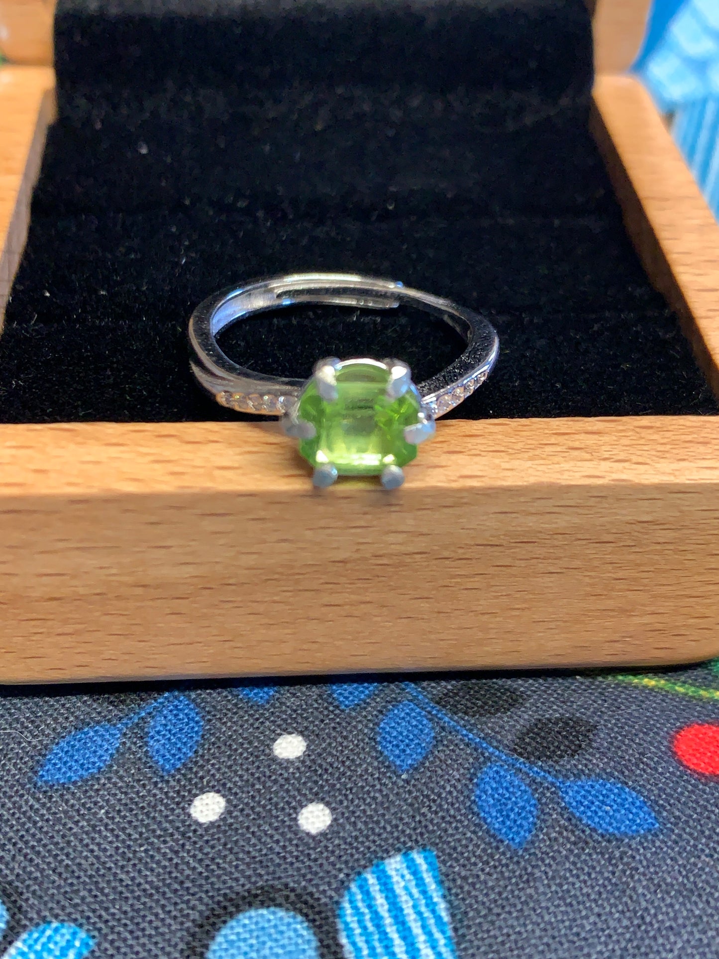 Natural 7mm Parrot Green Peridot Solitaire Ring in Sterling Silver